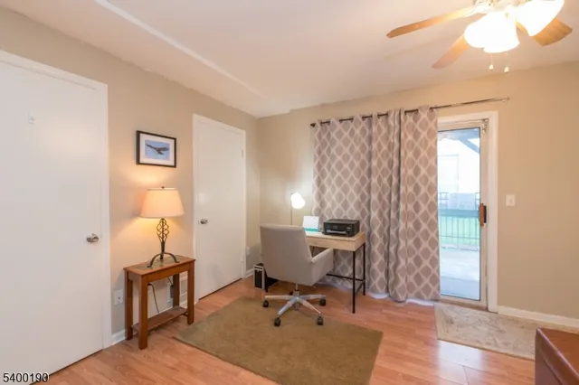 a workspace with furniture and a window