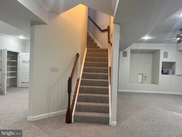 a view of an entryway with stairs