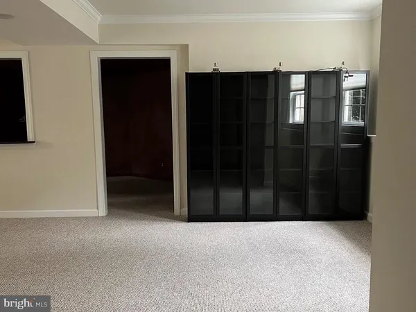 a view of a hallway with entryway