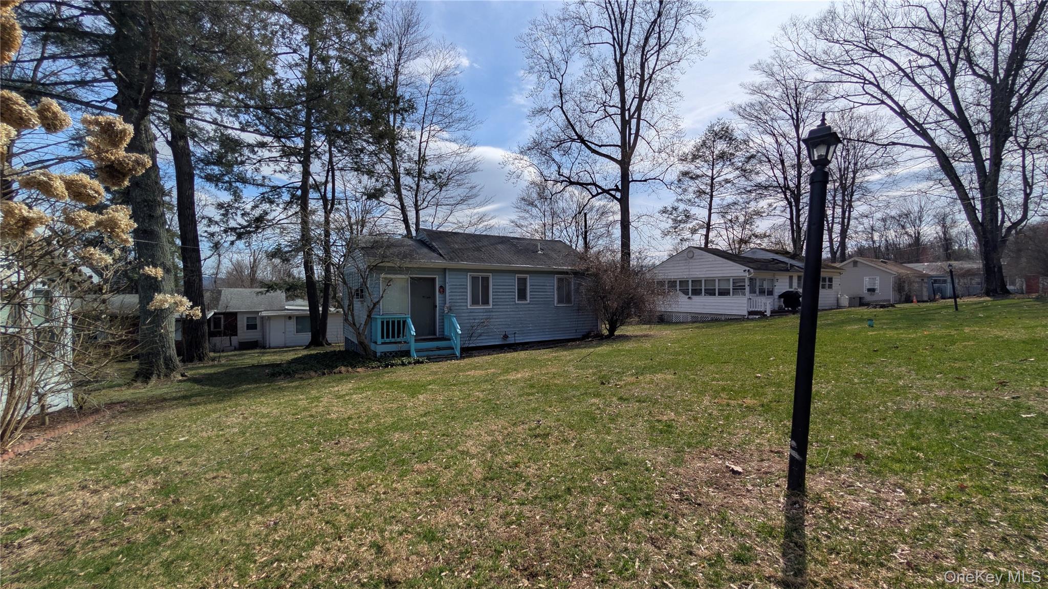 191 Sylvan Lake Road, Unit 5 Hopewell Junction, NY 12533 - Photo 20 of 28 a view of a house with a yard