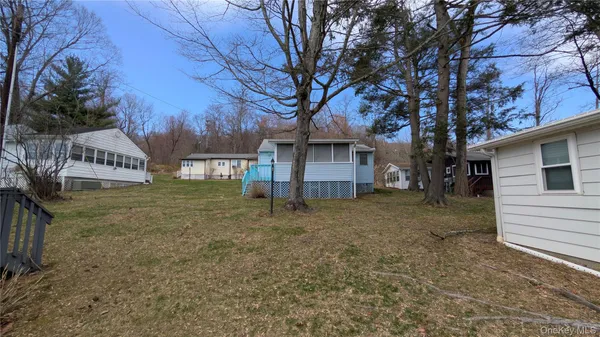 a house view with a backyard space