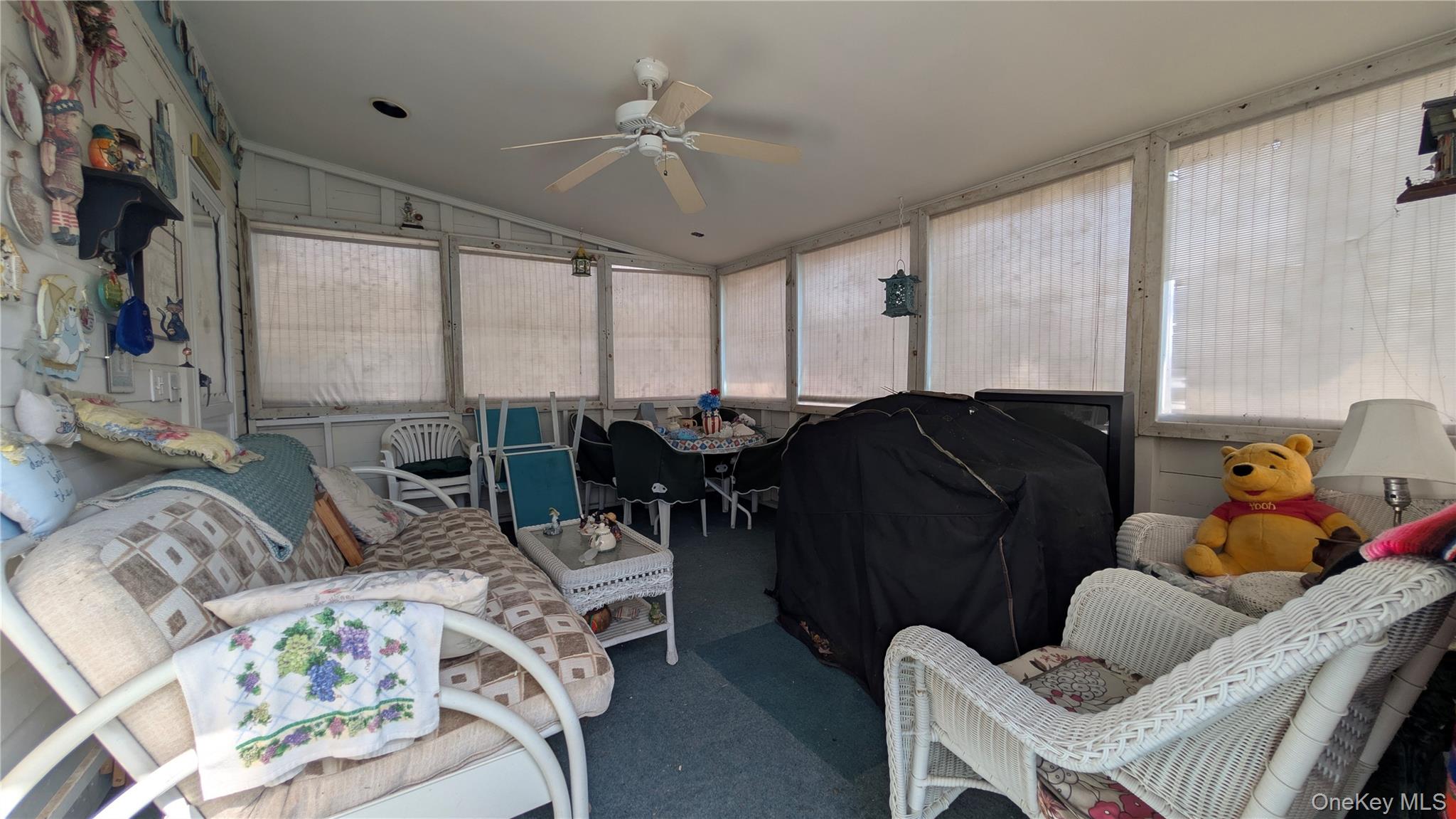 191 Sylvan Lake Road, Unit 5 Hopewell Junction, NY 12533 - Photo 5 of 28 a living room with furniture and a large window