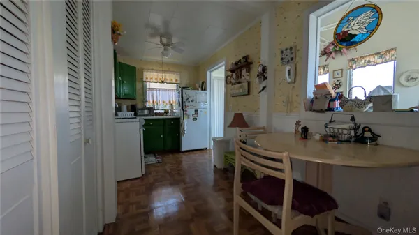 a kitchen with a sink cabinets and window