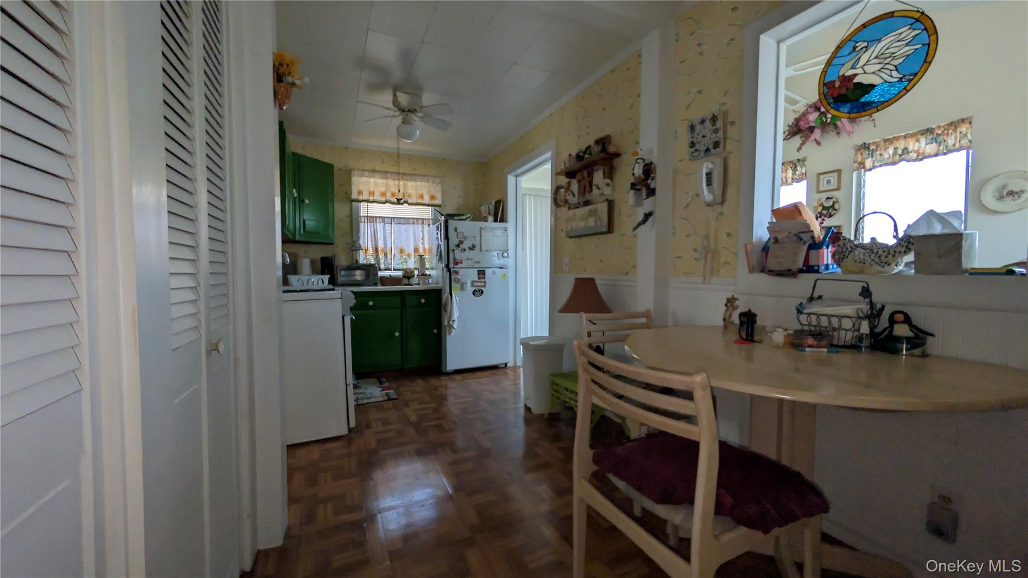 191 Sylvan Lake Road, Unit 5 Hopewell Junction, NY 12533 - Photo 9 of 28 a kitchen with a sink cabinets and window