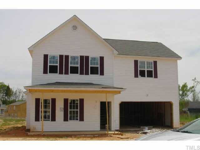 5324 Chipstone Drive Raleigh, NC 27610 - Photo 1 of 1 a front view of a house with garden