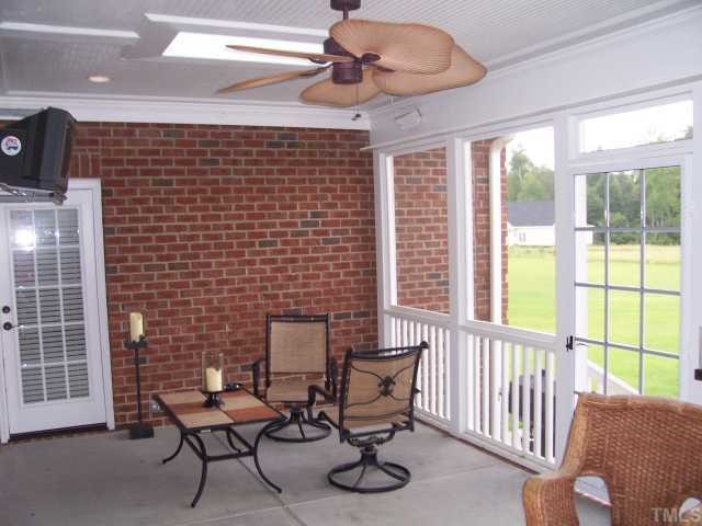 1529 Brick Mill Road Coats, NC 27521 - Photo 11 of 12 Peaceful screened in porch for relaxing