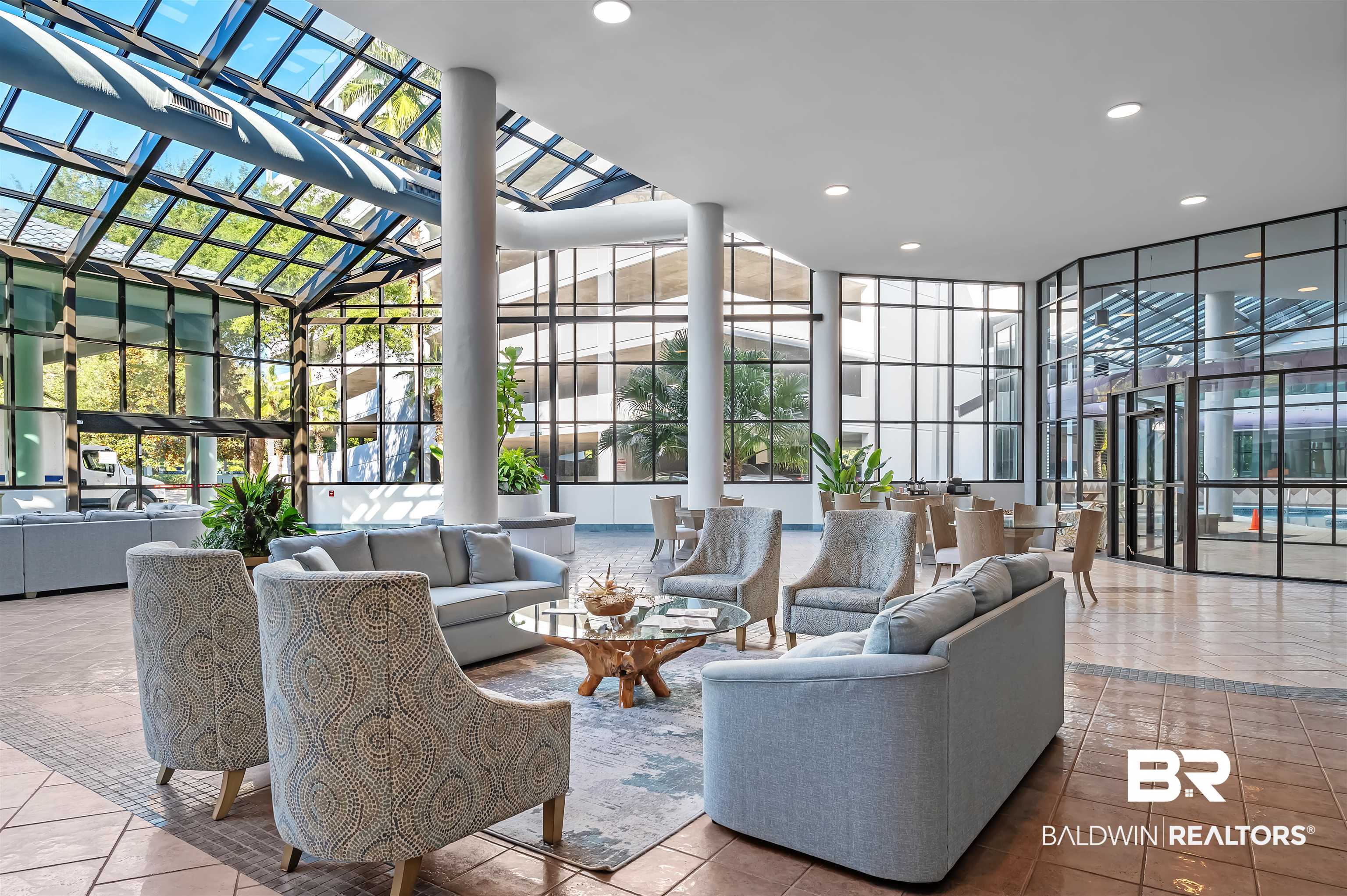 27582 Canal Road, Unit 2507 Orange Beach, AL 36561 - Photo 61 of 75 Building lobby featuring recessed lighting, a towering ceiling, and floor to ceiling windows