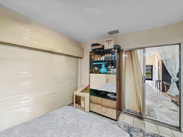 a view of a hallway with living room