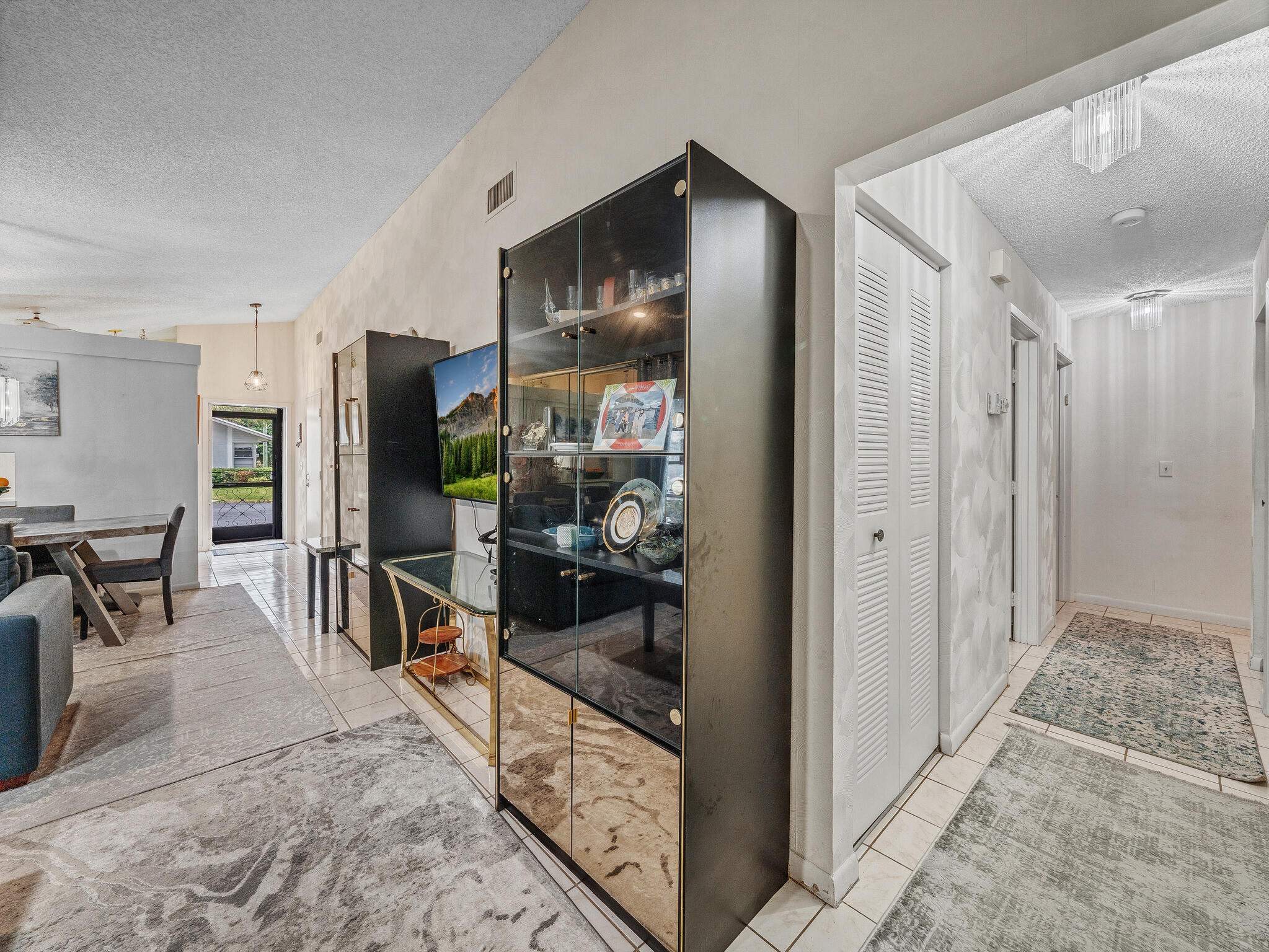 8592 Sunbird Place Boca Raton, FL 33496 - Photo 19 of 44 Hallway From Living Room