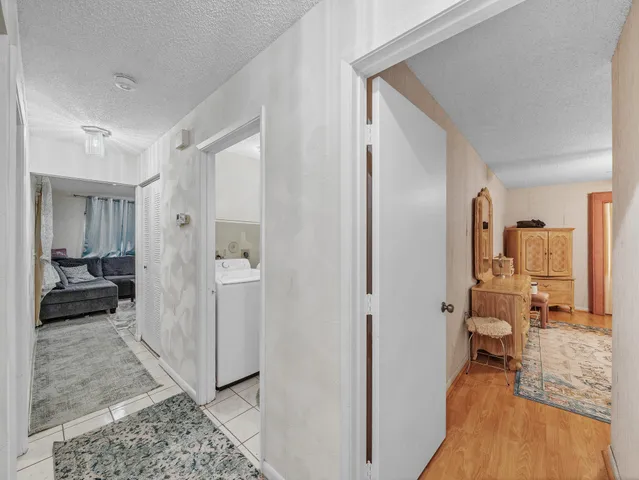 a view of a bathroom from a hallway