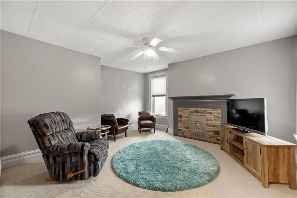 1520 4th Avenue Coraopolis, PA 15108 - Photo 21 of 37 a living room with furniture and a flat screen tv