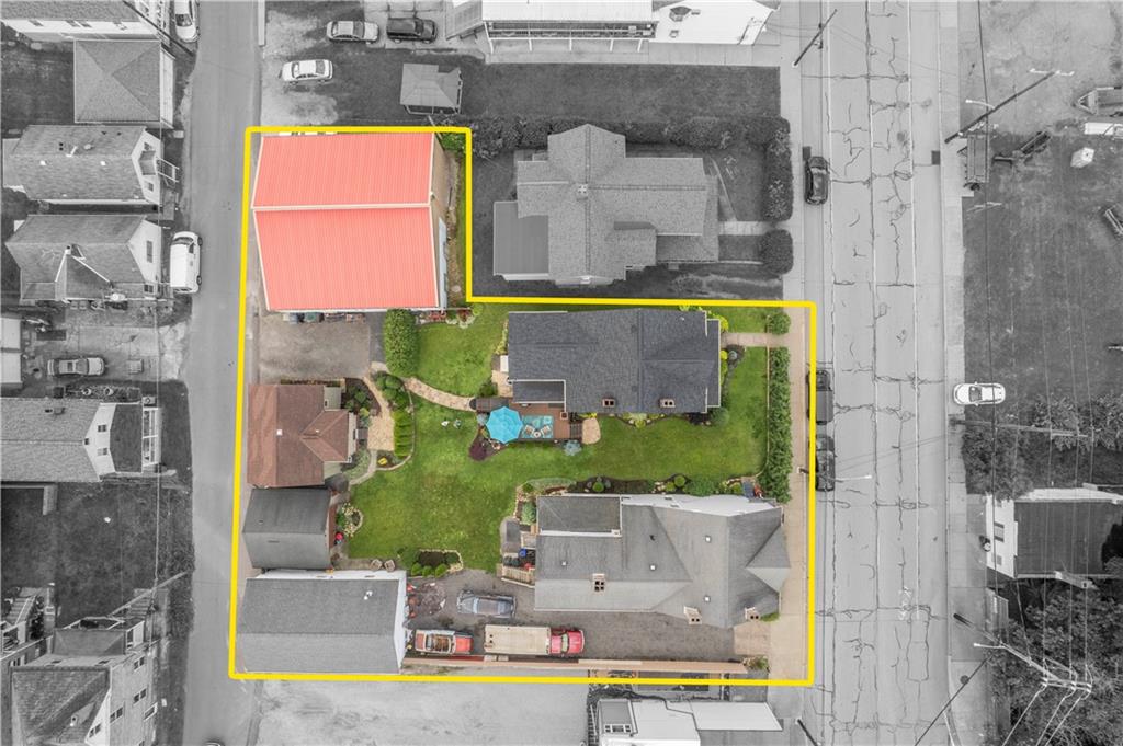 1520 4th Avenue Coraopolis, PA 15108 - Photo 37 of 37 an aerial view of a house with a swimming pool