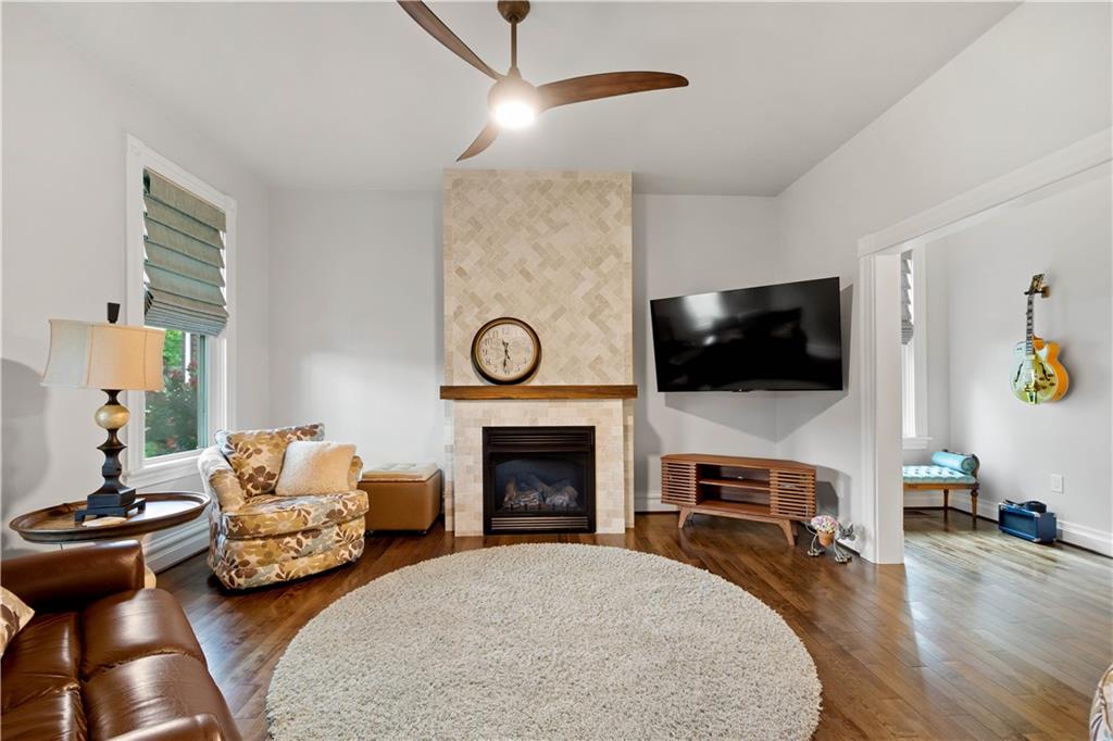 1520 4th Avenue Coraopolis, PA 15108 - Photo 7 of 37 a living room with furniture fireplace and flat screen tv