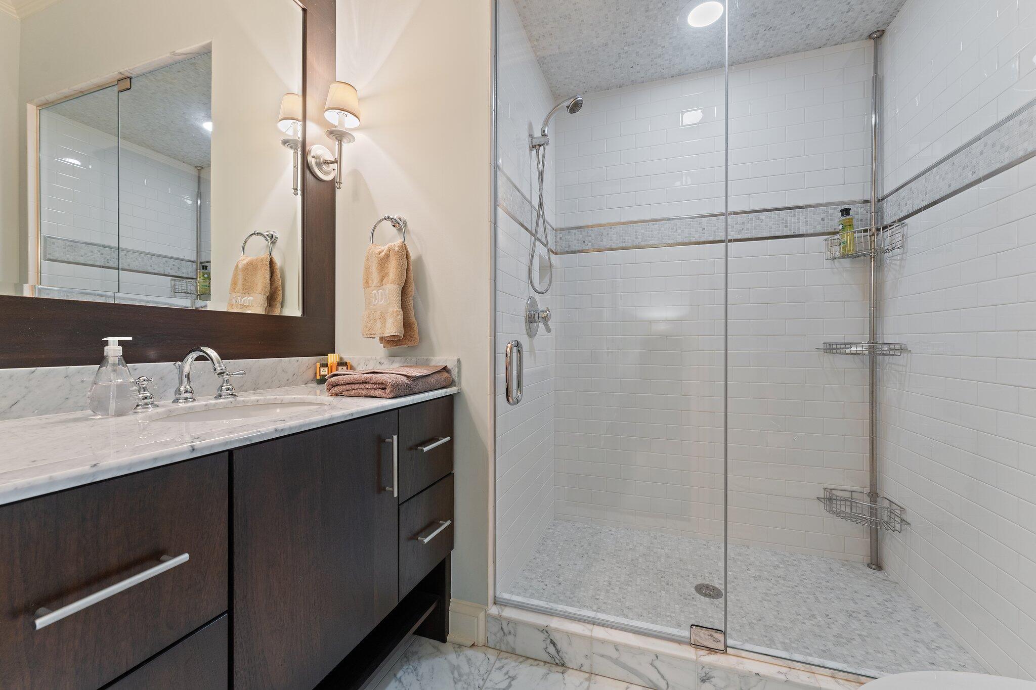 1191 Churchill Lane Crown Point, IN 46307 - Photo 40 of 80 a bathroom with a double vanity sink mirror and shower