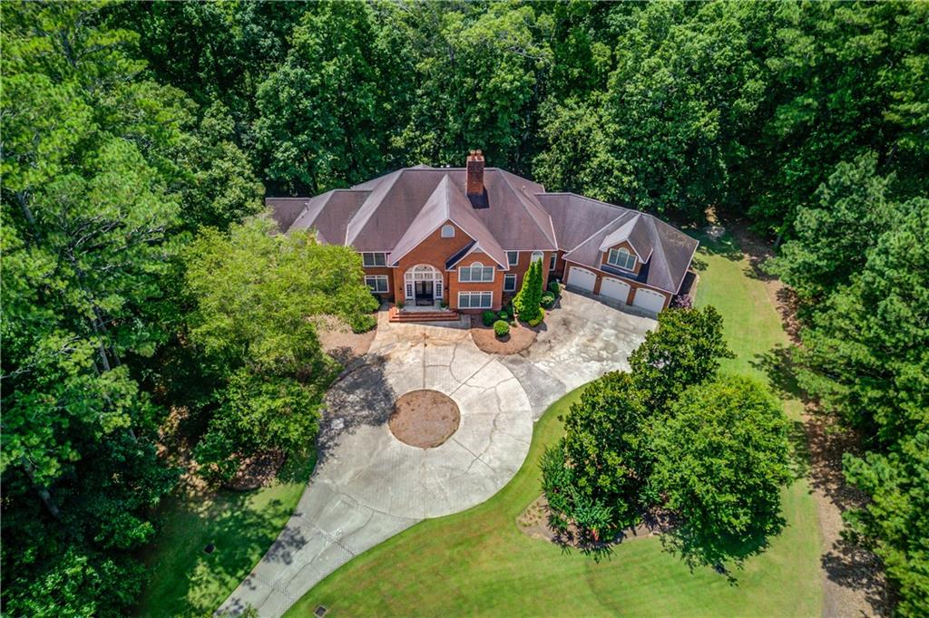 1345 Chandler Road Lawrenceville, GA 30045 - Photo 4 of 97 an aerial view of a house