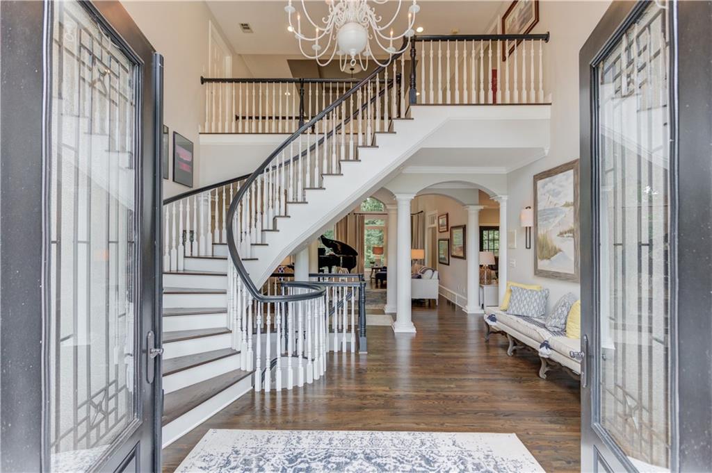 1345 Chandler Road Lawrenceville, GA 30045 - Photo 7 of 97 a view of entryway and hall with wooden floor