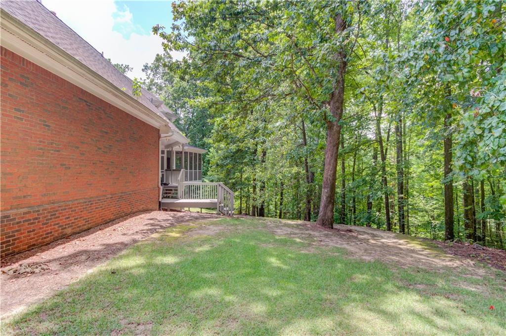 1345 Chandler Road Lawrenceville, GA 30045 - Photo 74 of 97 a view of a house with a yard