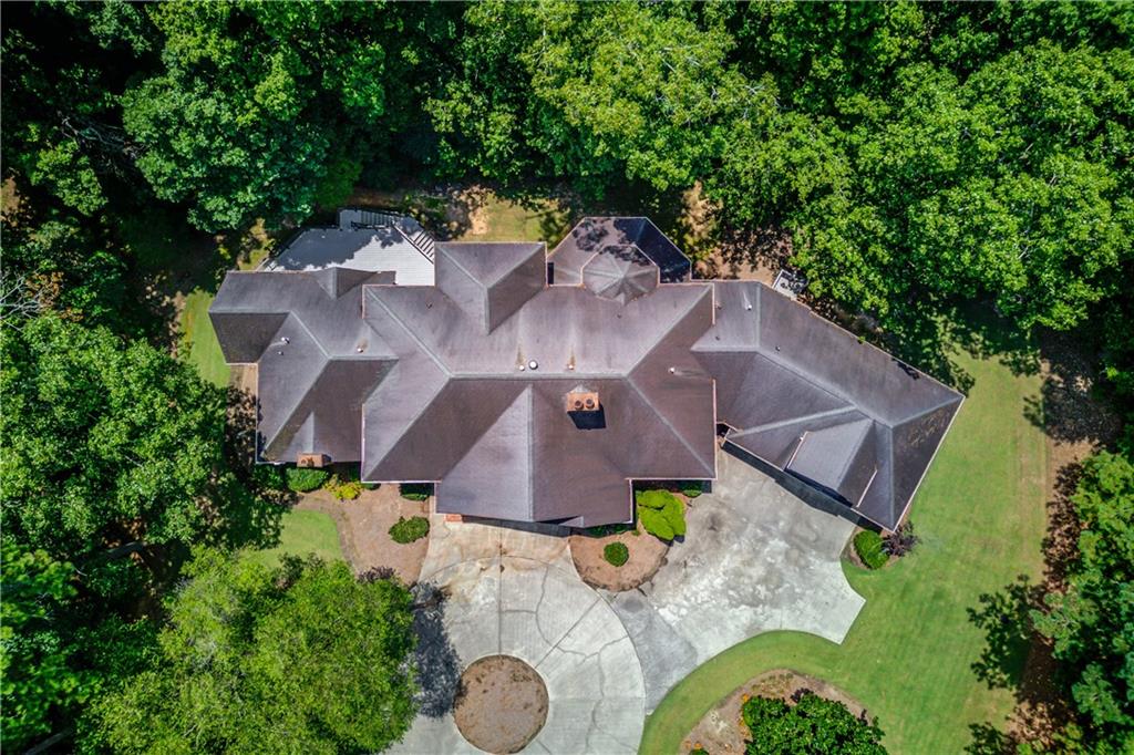 1345 Chandler Road Lawrenceville, GA 30045 - Photo 81 of 97 an aerial view of a house with a swimming pool