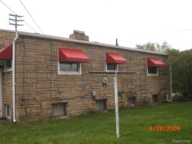 7215 Stephens Road Center Line, MI 48015 - Photo 2 of 8 rear