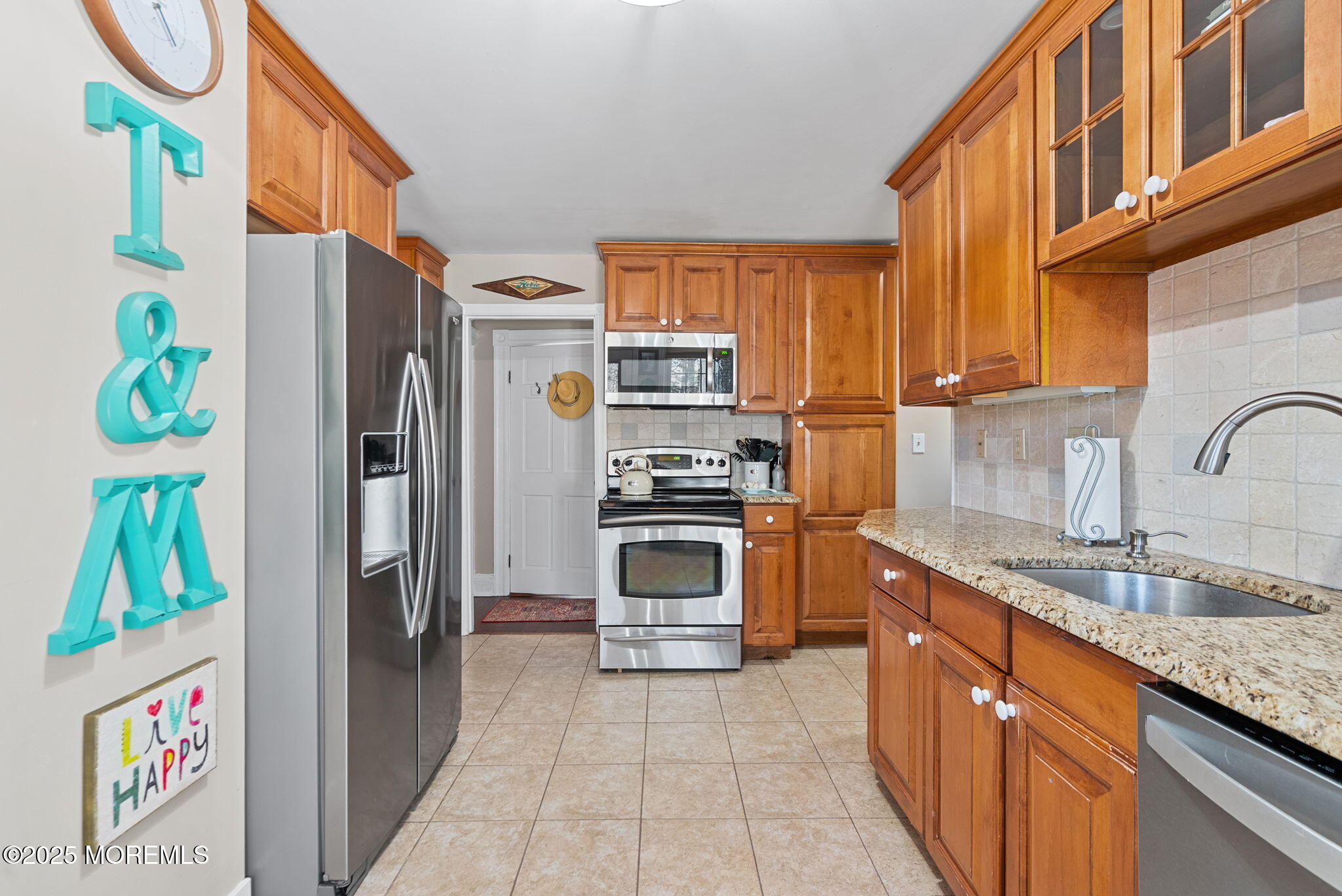 156 Old Tavern Road Farmingdale, NJ 07727 - Photo 14 of 43 a kitchen with stainless steel appliances granite countertop a refrigerator and a sink