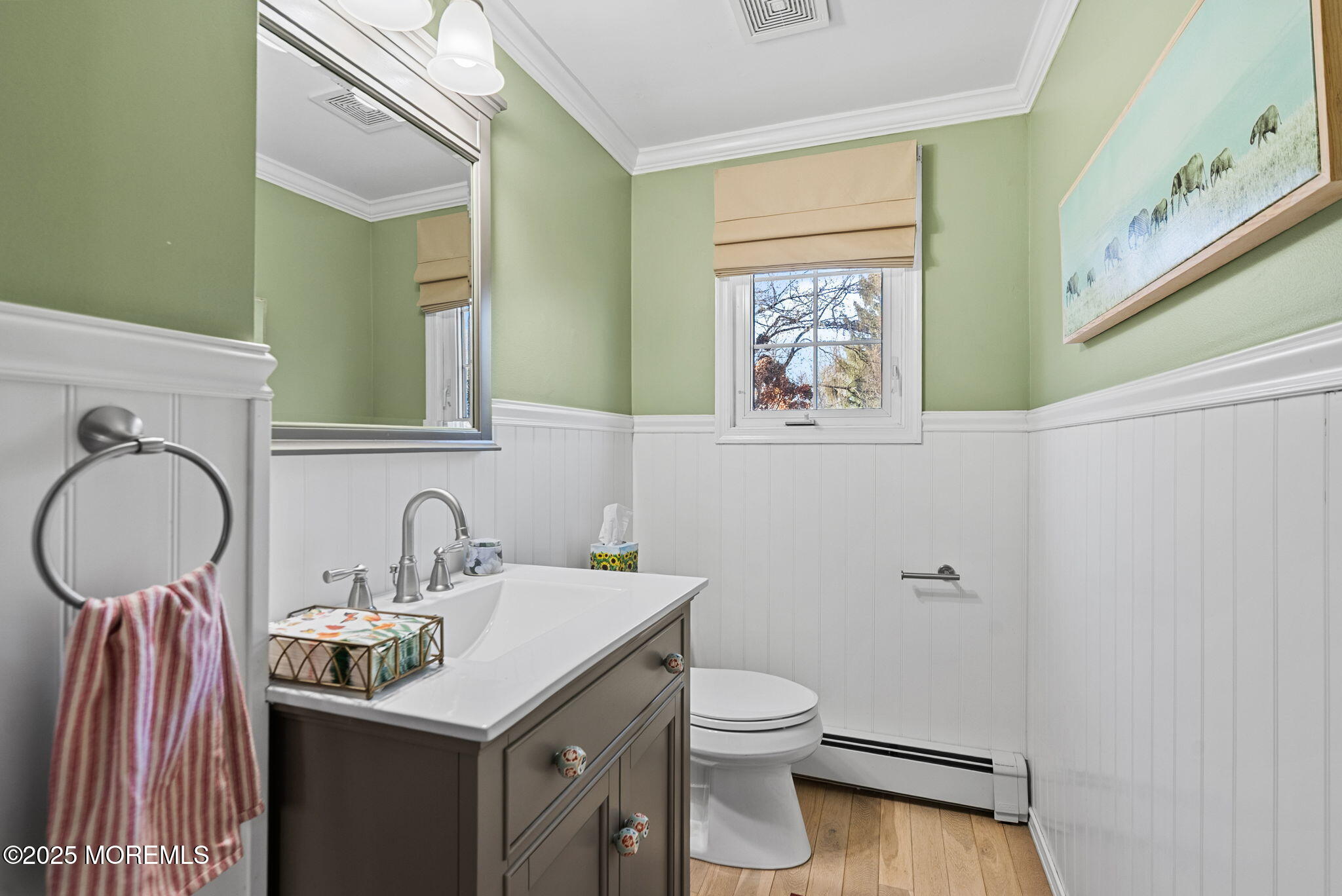 156 Old Tavern Road Farmingdale, NJ 07727 - Photo 20 of 43 a bathroom with a toilet a sink and a mirror