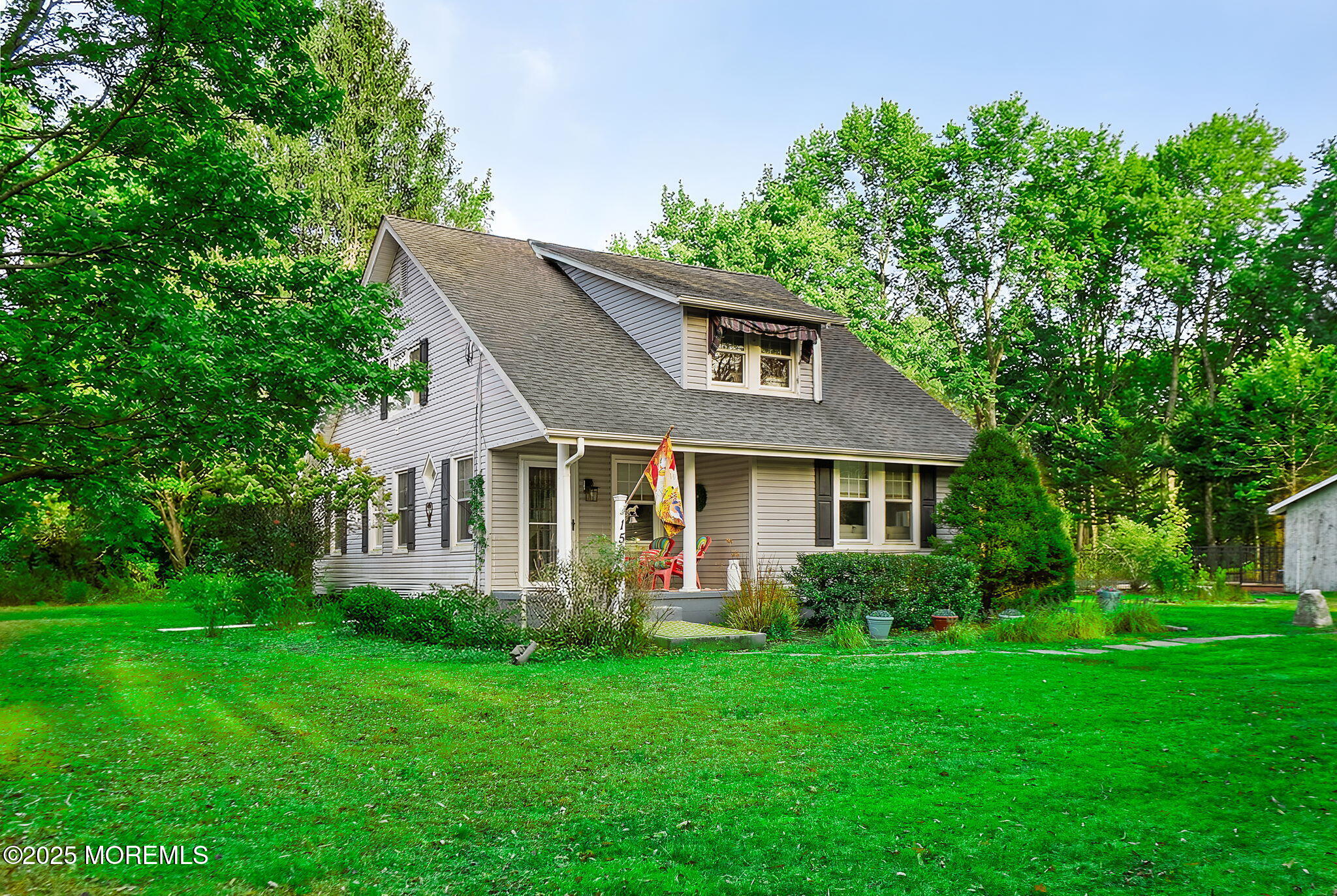 156 Old Tavern Road Farmingdale, NJ 07727 - Photo 2 of 43 a front view of house with yard and green space