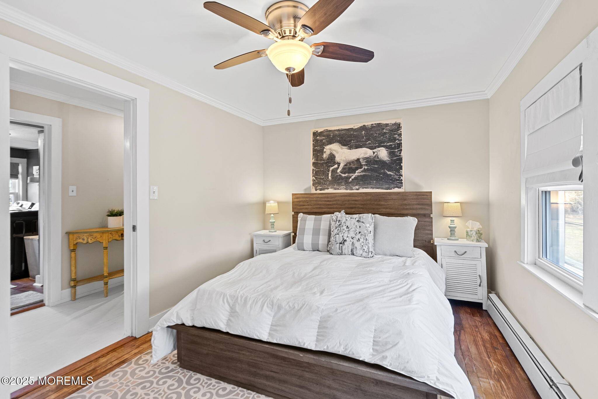 156 Old Tavern Road Farmingdale, NJ 07727 - Photo 23 of 43 a bedroom with a bed and a chandelier