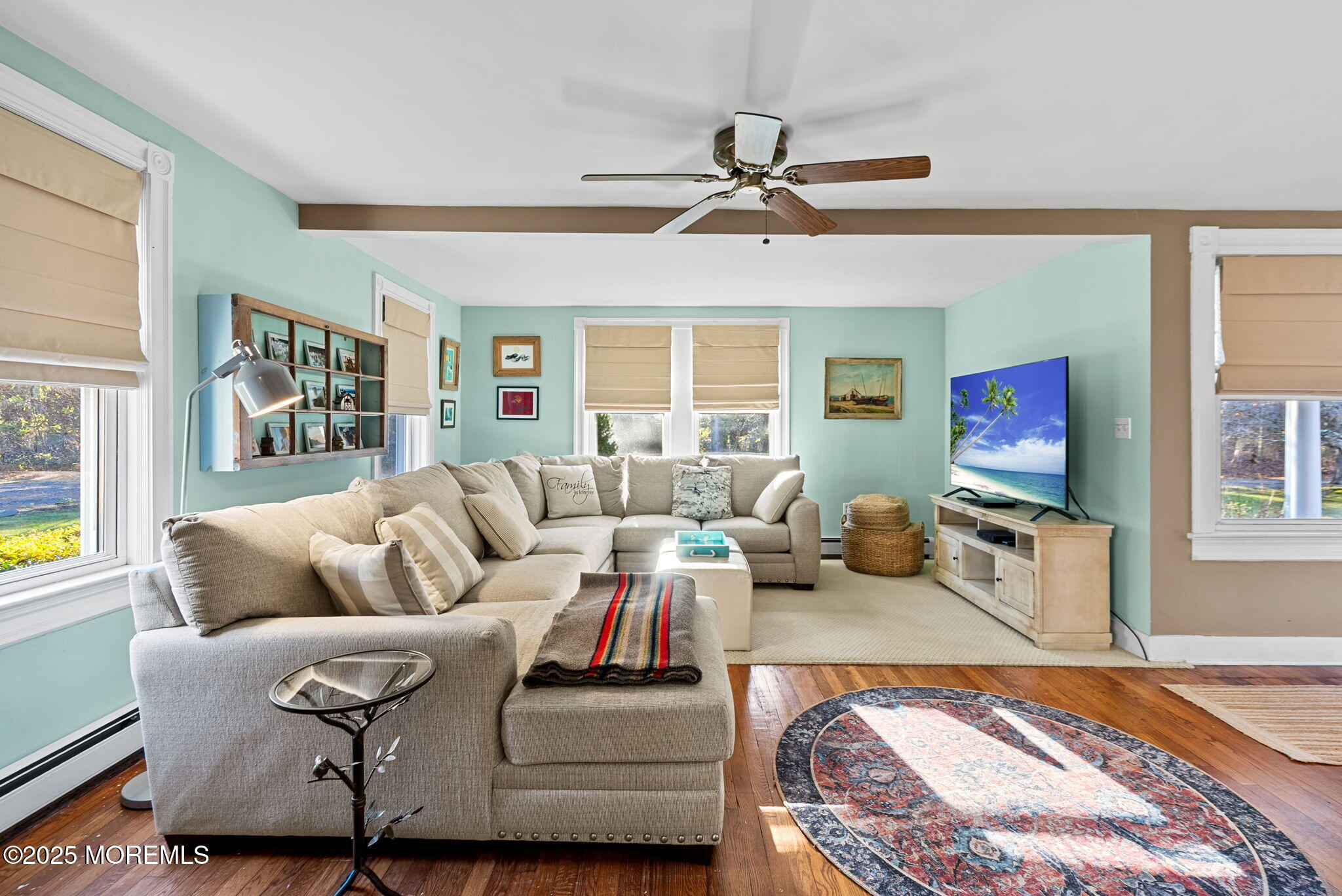 156 Old Tavern Road Farmingdale, NJ 07727 - Photo 10 of 43 a living room with furniture and a flat screen tv