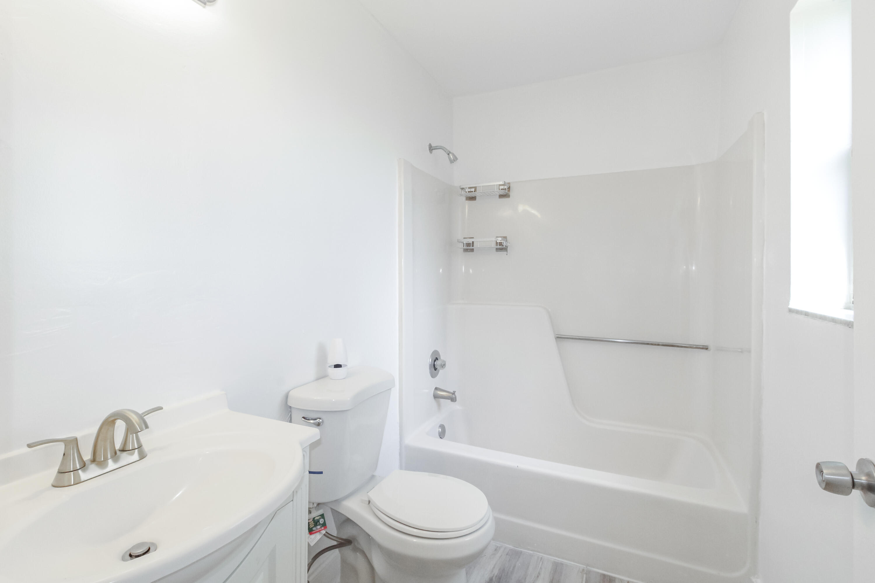 21 Crossings Circle, Unit B Boynton Beach, FL 33435 - Photo 2 of 12 a bathroom with a sink toilet and shower