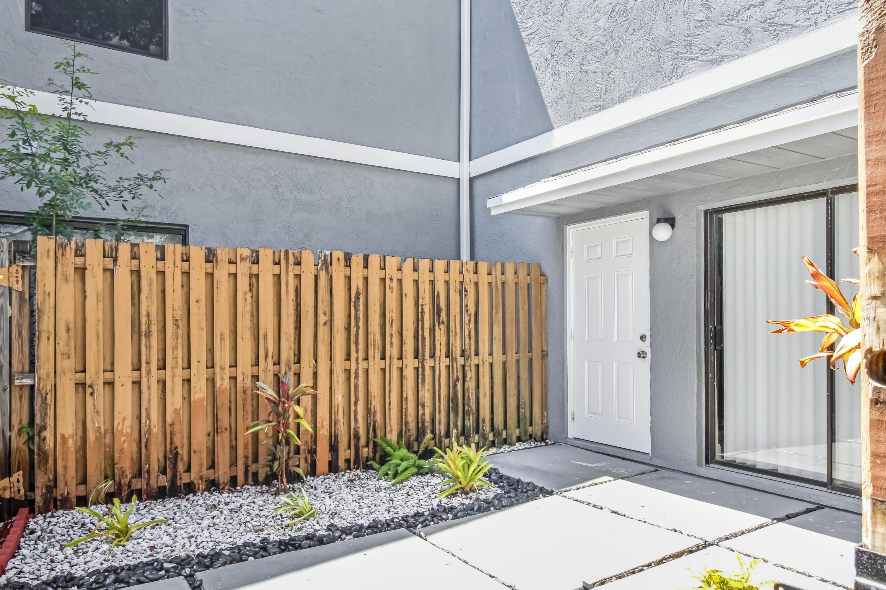 21 Crossings Circle, Unit B Boynton Beach, FL 33435 - Photo 8 of 12 a view of a entryway door of the house