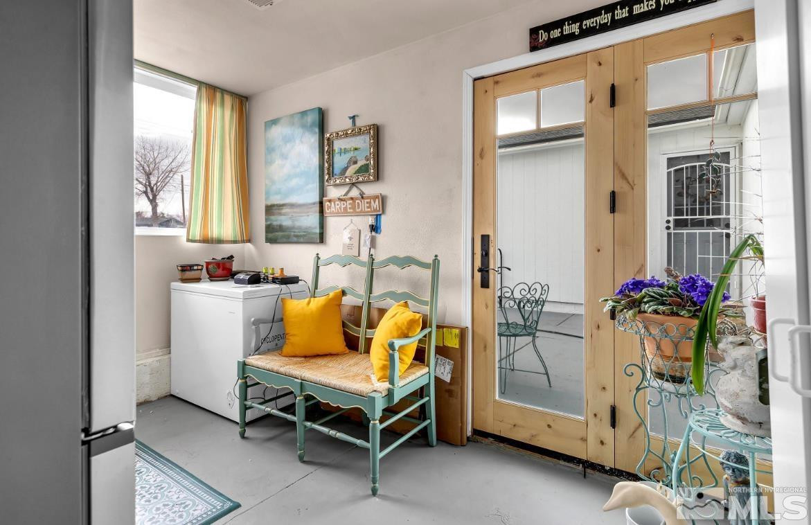 990 Riverview Drive Gardnerville, NV 89460 - Photo 30 of 40 a bedroom with furniture and a window