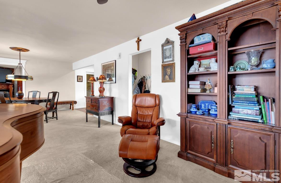 990 Riverview Drive Gardnerville, NV 89460 - Photo 32 of 40 a room with furniture and a book shelf