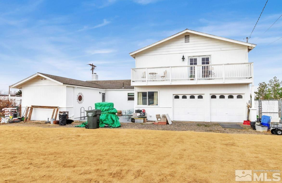 990 Riverview Drive Gardnerville, NV 89460 - Photo 37 of 40 a front view of a house with a yard