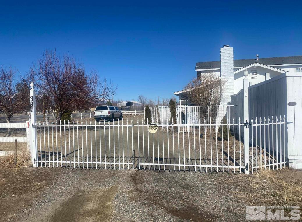 990 Riverview Drive Gardnerville, NV 89460 - Photo 39 of 40 a view of a house with a small yard