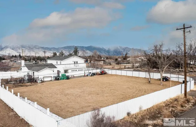 a view of swimming pool with outdoor seating