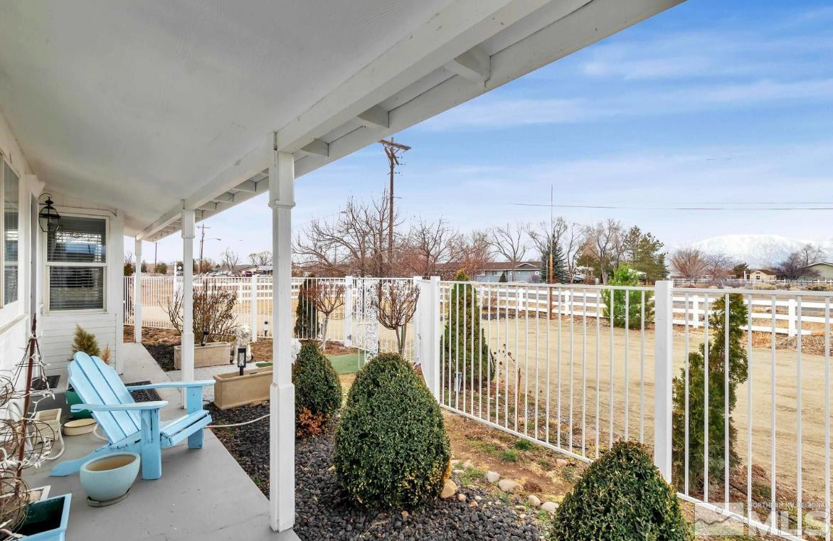 990 Riverview Drive Gardnerville, NV 89460 - Photo 6 of 40 a balcony with chairs