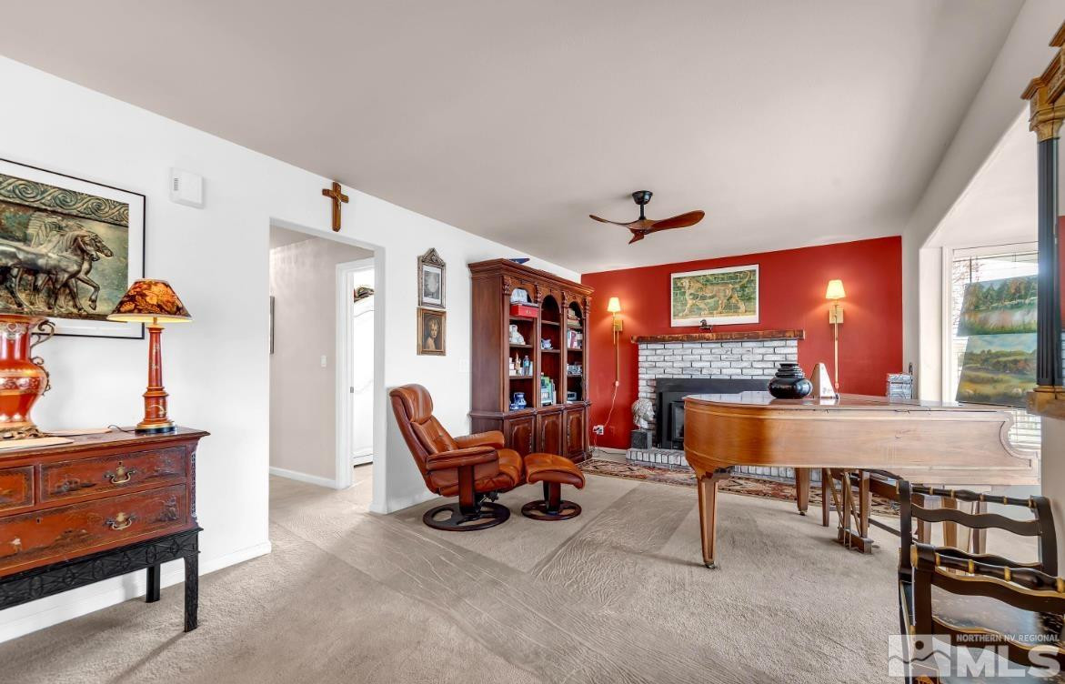 990 Riverview Drive Gardnerville, NV 89460 - Photo 8 of 40 a view of a livingroom with furniture and a piano