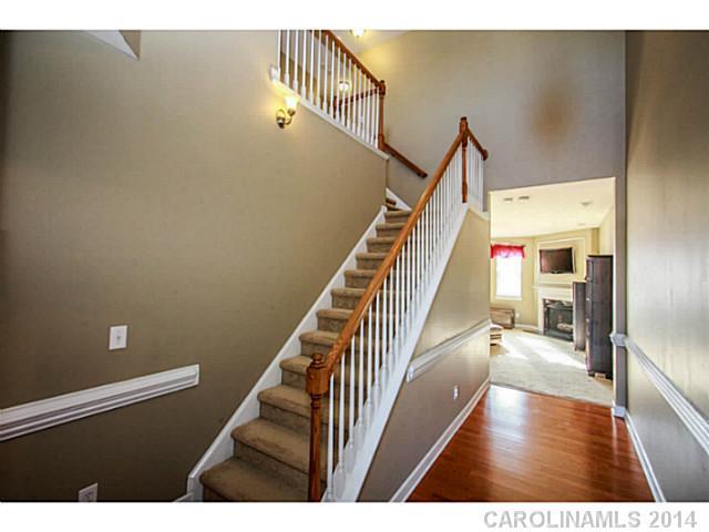 12106 Red Rust Lane Charlotte, NC 28277 - Photo 2 of 16 a view of entryway and hall with wooden floor