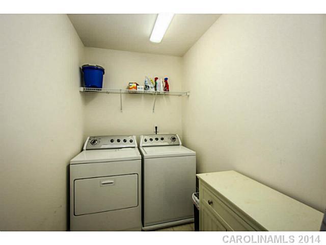 12106 Red Rust Lane Charlotte, NC 28277 - Photo 9 of 16 a utility room with dryer and washer