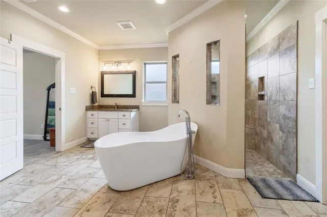 a living room with a couch and a shower