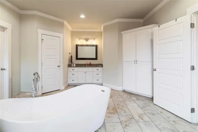 a large white tub with white walls