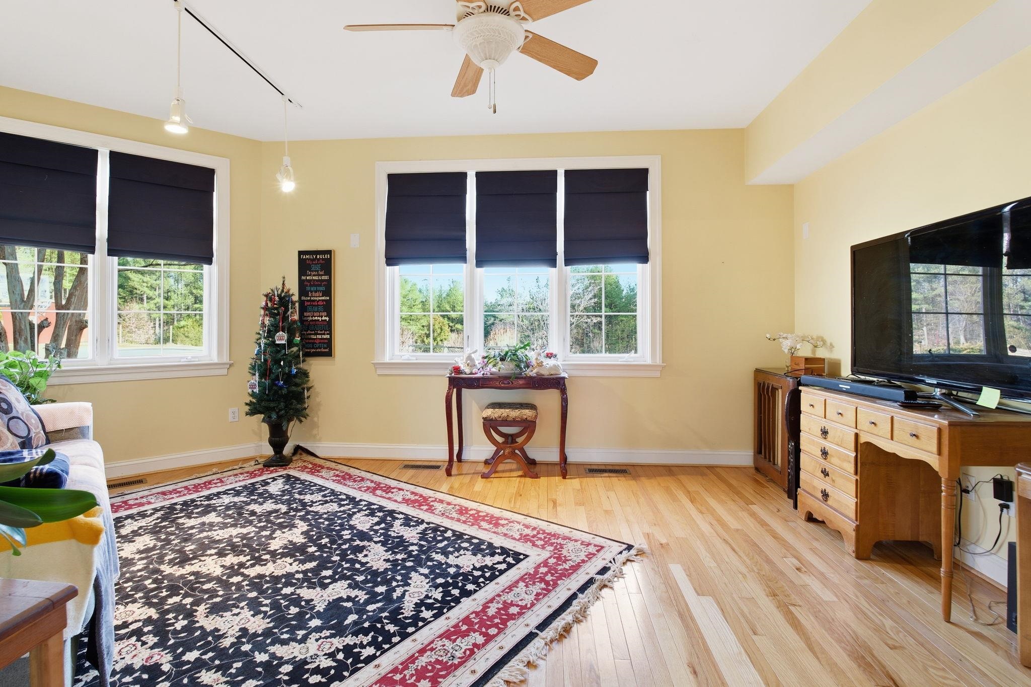436 Chimney Rock Road Earlysville, VA 22936 - Photo 16 of 61 a living room with fireplace furniture and a window