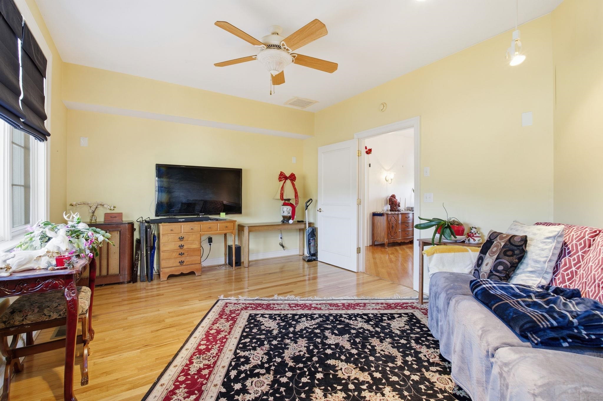 436 Chimney Rock Road Earlysville, VA 22936 - Photo 17 of 61 a living room with furniture and a flat screen tv