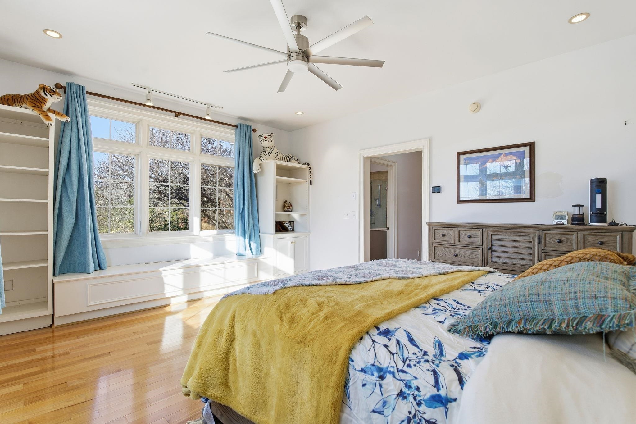 436 Chimney Rock Road Earlysville, VA 22936 - Photo 25 of 61 a bedroom with a large bed and a large window