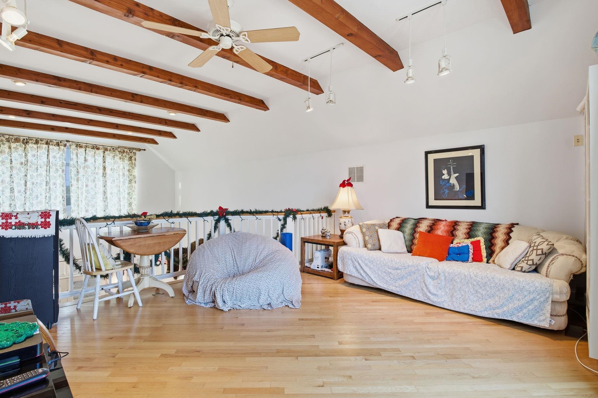 436 Chimney Rock Road Earlysville, VA 22936 - Photo 31 of 61 a living room with furniture and a ceiling fan