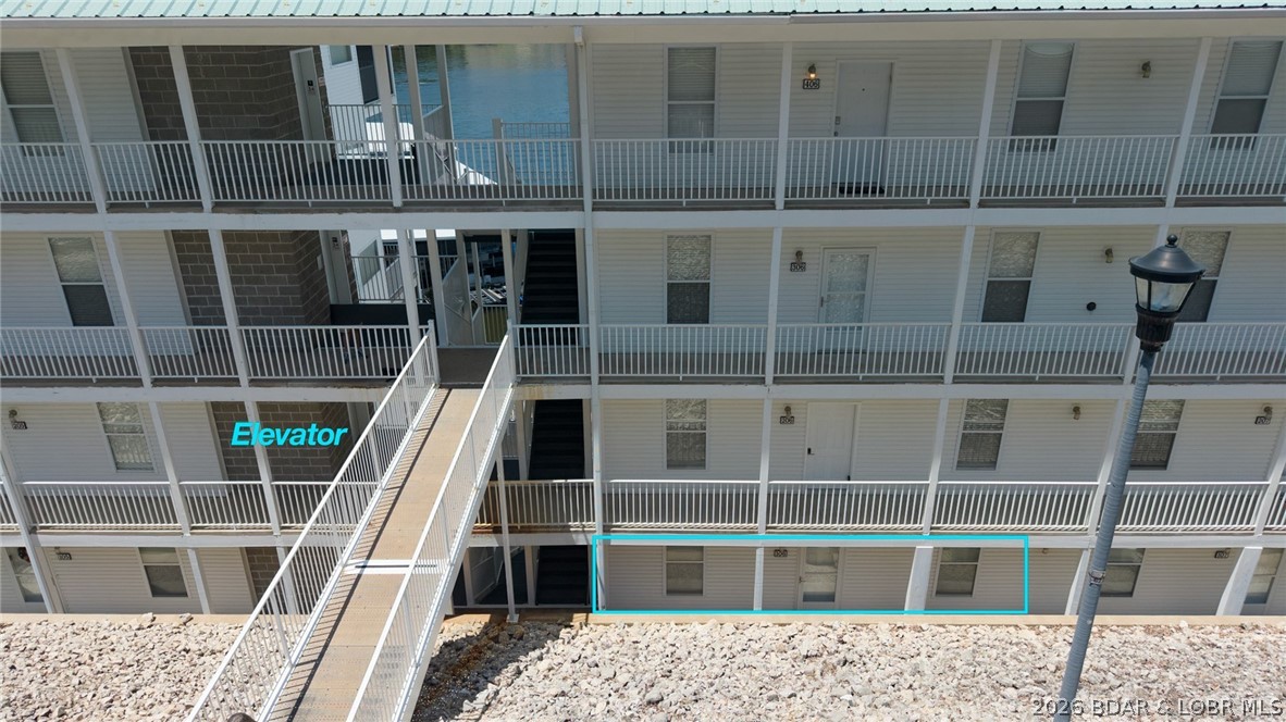 275 Flynn Road, Unit 106 Lake Ozark, MO 65049 - Photo 34 of 39 Only steps from the elevator with access to parkin