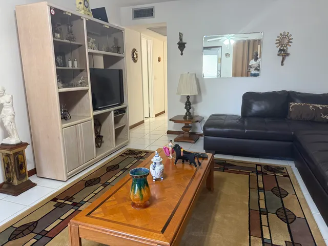 a room with furniture and a chandelier