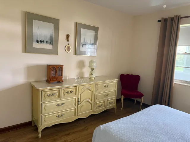 a room with furniture and window