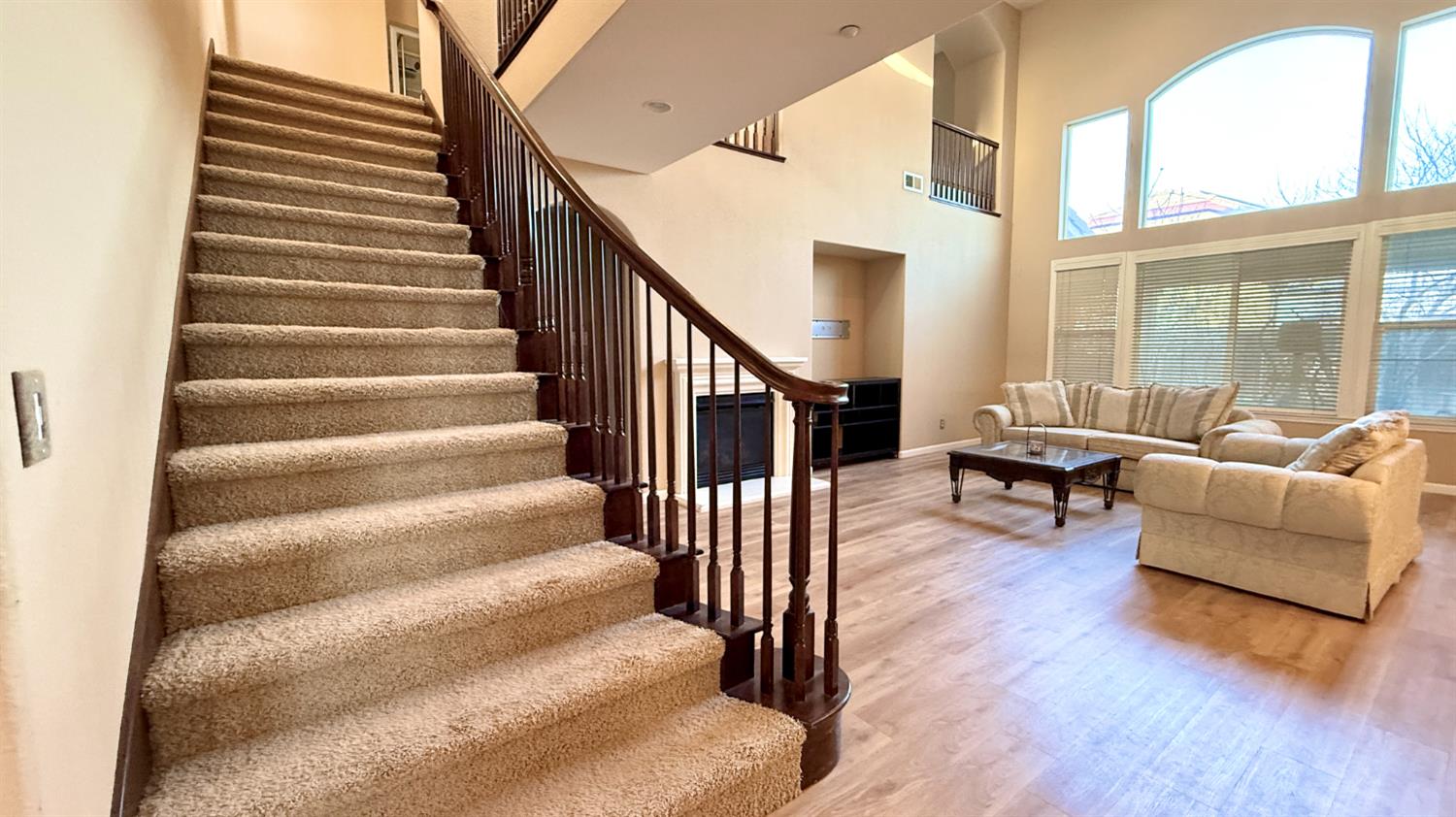16206 Sand Bar Way Lathrop, CA 95330 - Photo 14 of 32 a view of staircase with wooden floor and furniture