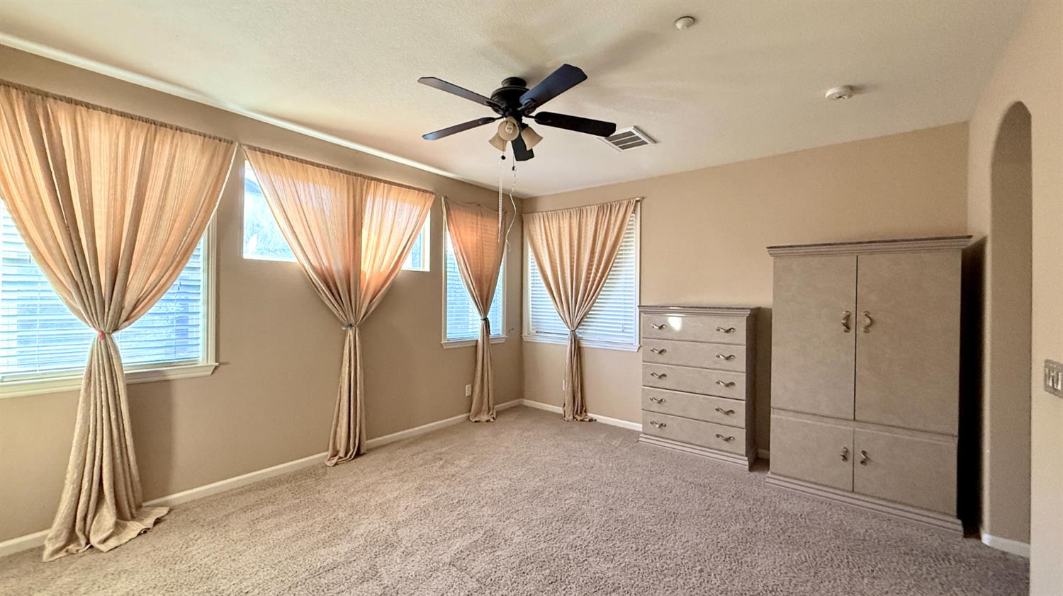 16206 Sand Bar Way Lathrop, CA 95330 - Photo 19 of 32 wooden floor in an empty room with a window